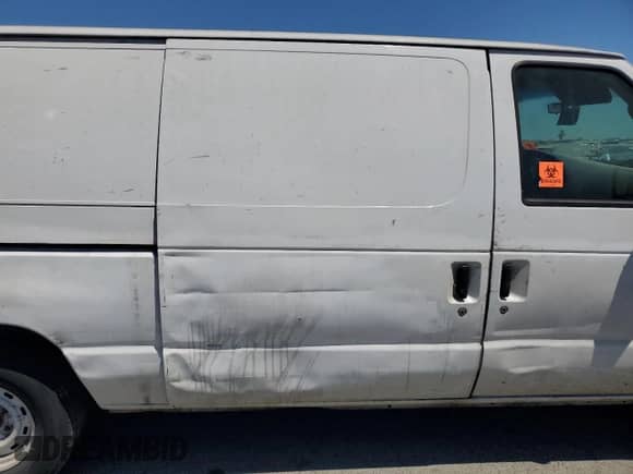 2003 Ford Econoline Cargo с VIN 1FTRE14293HA13605, выставлен на аукционе Copart как лот 64129745 с пробегом 256 829 миль миль и Списание • Salvage title. История ставок и продаж доступна на DreamBid. Изображение 11.
