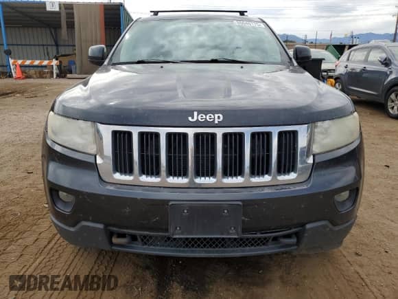 2012 Jeep Grand Cherokee Laredo z VIN 1C4RJFAG5CC202791, wystawiony jako Copart lot #86040175 z przebiegiem 206 265 mil mil oraz Szkoda całkowita • Salvage title. Historia ofert i sprzedaży dostępna na DreamBid. Obrazek 5.