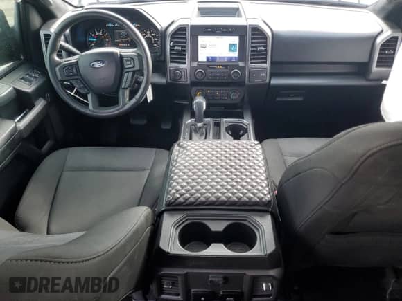 2020 Ford F-150 XL with VIN 1FTEW1C53LKD71731, listed as a Copart auction lot 82195405 with 87,381 mi miles and Salvage title. Bid and sale history available at DreamBid. Image 8.