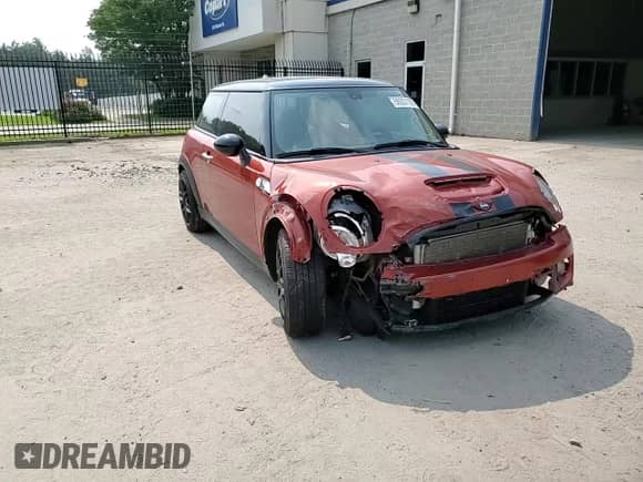 2013 MINI Hardtop S with VIN WMWSV3C52DT396176, listed as a Copart auction lot 59207165 with 104,194 mi miles and Salvage title. Bid and sale history available at DreamBid. Image 13.