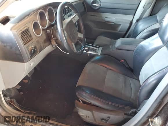 2006 Dodge Charger SRT-8 с VIN 2B3KA73W16H385931, выставлен на аукционе Copart как лот 57815795 с пробегом 125 706 миль миль и Списание • Salvage title. История ставок и продаж доступна на DreamBid. Изображение 7.