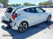 2013 Hyundai Veloster w/Gray Int z VIN KMHTC6ADXDU119323, wystawiony jako IAAI lot #41803517 z przebiegiem 100 709 mil mil oraz . Historia ofert i sprzedaży dostępna na DreamBid. Obrazek 4.