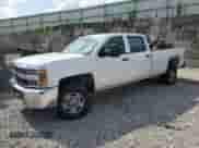 2015 Chevrolet Silverado 2500HD Work Truck z VIN 1GC1KUEG9FF103421, wystawiony jako Copart lot #65182885 z przebiegiem 155 513 mil mil oraz Szkoda całkowita • Salvage title. Historia ofert i sprzedaży dostępna na DreamBid. Obrazek 1.
