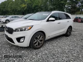 2016 Kia Sorento SXL z VIN 5XYPKDA54GG087190, wystawiony jako Copart lot #69130865 z przebiegiem 191 872 mil mil oraz Szkoda całkowita • Salvage title. Historia ofert i sprzedaży dostępna na DreamBid. Obrazek 1.