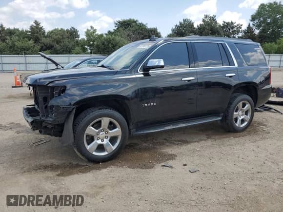 2020 Chevrolet Tahoe LS z VIN 1GNSKAKC6LR309608, wystawiony jako Copart lot #61208735 z przebiegiem 88 234 mil mil oraz Szkoda całkowita • Salvage title. Historia ofert i sprzedaży dostępna na DreamBid. Obrazek 1.