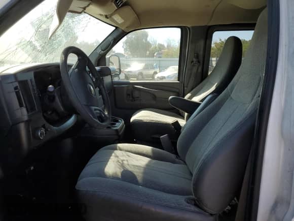 2012 Chevrolet Express Passenger 1LT with VIN 1GAZG1FG4C1100252, listed as a Copart auction lot 73242444 with 76,779 mi miles and Salvage title. Bid and sale history available at DreamBid. Image 7.