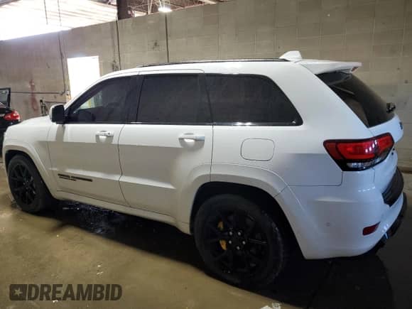 2020 Jeep Grand Cherokee Trackhawk с VIN 1C4RJFN97LC141522, выставлен на аукционе Copart как лот 80134014 с пробегом 53 494 миль миль и Списание • Salvage title. История ставок и продаж доступна на DreamBid. Изображение 2.