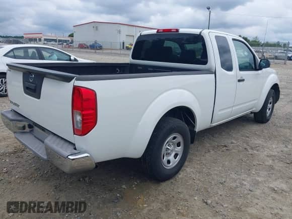 2014 Nissan Frontier S with VIN 1N6BD0CT6EN761092, listed as a IAAI auction lot 42201154 with 142,271 mi miles and . Bid and sale history available at DreamBid. Image 4.