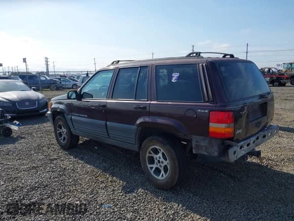 1996 Jeep Grand Cherokee Laredo z VIN 1J4GZ58S2TC262980, wystawiony jako IAAI lot #41949514 z przebiegiem 269 674 mil mil oraz . Historia ofert i sprzedaży dostępna na DreamBid. Obrazek 3.