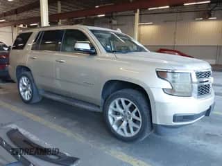 2017 Chevrolet Tahoe LT with VIN 1GNSCBKC5HR128980, listed as a IAAI auction lot 42644191 with 203,635 mi miles and . Bid and sale history available at DreamBid. Image 1.