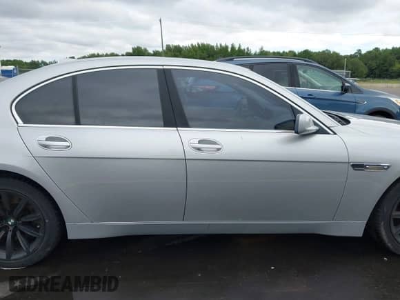 2003 BMW 7 Series 745i z VIN WBAGL63403DP68207, wystawiony jako IAAI lot #42992261 z przebiegiem 104 703 mil mil oraz . Historia ofert i sprzedaży dostępna na DreamBid. Obrazek 14.