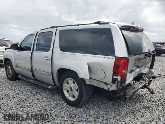 2011 Chevrolet Suburban LT with VIN 1GNSCJE0XBR166076, listed as a Copart auction lot 85882165 with 169,114 mi miles and Salvage title. Bid and sale history available at DreamBid. Image 2.