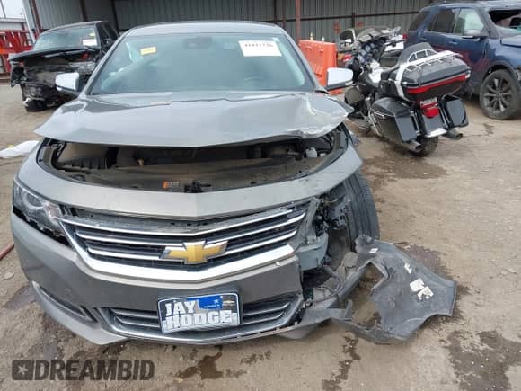 2017 Chevrolet Impala Premier with VIN 2G1145S30H9125278, listed as a IAAI auction lot 41811726 with 56,944 mi miles and . Bid and sale history available at DreamBid. Image 12.