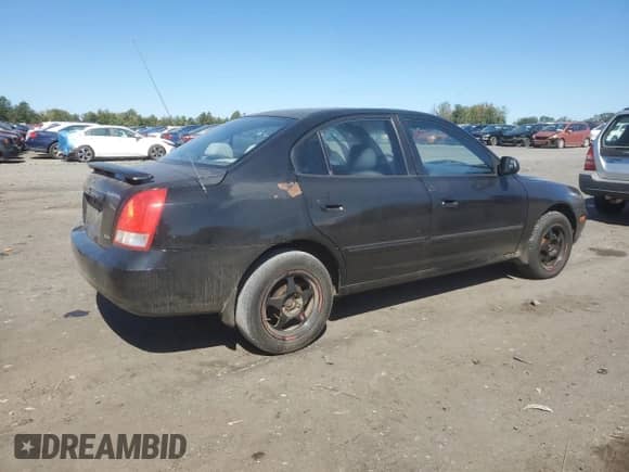 2002 Hyundai Elantra GLS with VIN KMHDN45D02U444024, listed as a Copart auction lot 71193495 with 194,533 mi miles and Salvage title. Bid and sale history available at DreamBid. Image 3.