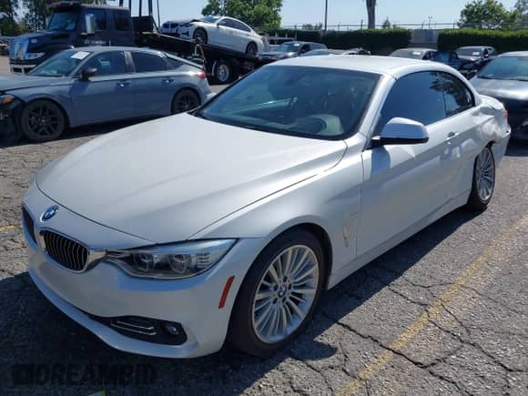 2015 BMW 4 Series 428i with VIN WBA3V7C51FP771904, listed as a IAAI auction lot 42316801 with 93,391 mi miles and . Bid and sale history available at DreamBid. Image 17.