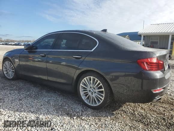 2016 BMW 5 Series 550i xDrive with VIN WBAKP9C58GD980321, listed as a Copart auction lot 84250044 with 100,052 mi miles and Salvage title. Bid and sale history available at DreamBid. Image 2.
