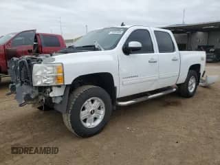 2013 Chevrolet Silverado 1500 LTZ with VIN 3GCPKTE73DG338235, listed as a Copart auction lot 71291895 with 218,457 mi miles and Salvage title. Bid and sale history available at DreamBid. Image 1.