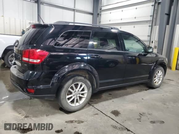 2017 Dodge Journey SXT with VIN 3C4PDDBG0HT512425, listed as a Copart auction lot 81026535 with 145,124 mi miles and Salvage title. Bid and sale history available at DreamBid. Image 3.