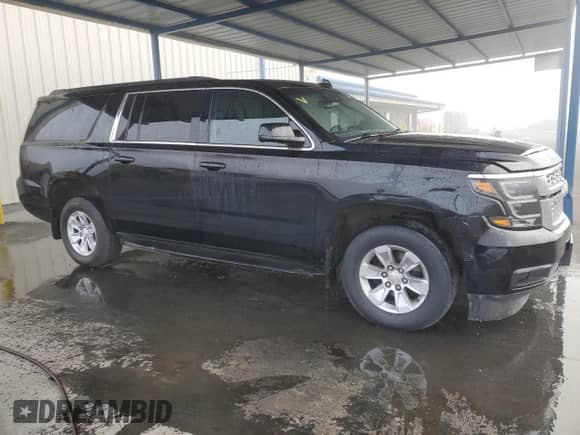 2015 Chevrolet Suburban LT z VIN 1GNSCJKC7FR570828, wystawiony jako Copart lot #82447725 z przebiegiem 64 997 mil mil oraz Szkoda całkowita • Salvage title. Historia ofert i sprzedaży dostępna na DreamBid. Obrazek 4.