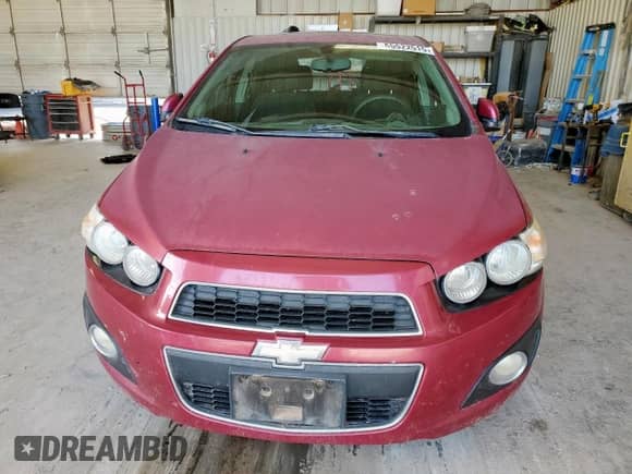 2014 Chevrolet Sonic LT with VIN 1G1JC6SHXE4132404, listed as a Copart auction lot 65522515 with 86,388 mi miles and Salvage title. Bid and sale history available at DreamBid. Image 5.