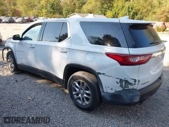 2020 Chevrolet Traverse LS with VIN 1GNERFKW6LJ113702, listed as a IAAI auction lot 43250391 with 73,072 mi miles and . Bid and sale history available at DreamBid. Image 3.
