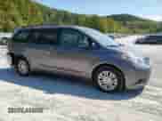 2015 Toyota Sienna XLE with VIN 5TDYK3DC7FS567248, listed as a Copart auction lot 80903245 with 143,175 mi miles and Salvage title. Bid and sale history available at DreamBid. Image 4.
