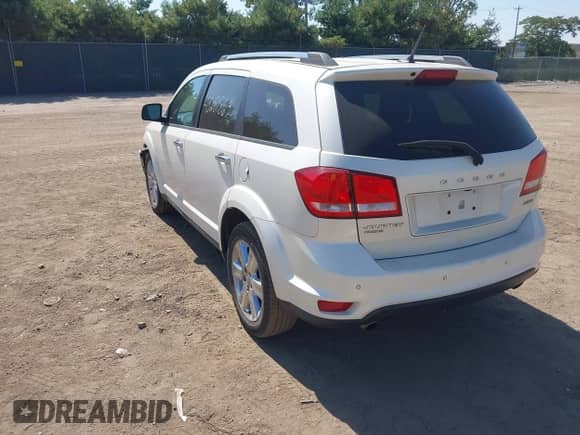 2013 Dodge Journey Crew with VIN 3C4PDDDG7DT666749, listed as a IAAI auction lot 43251863 with 169,684 mi miles and . Bid and sale history available at DreamBid. Image 3.
