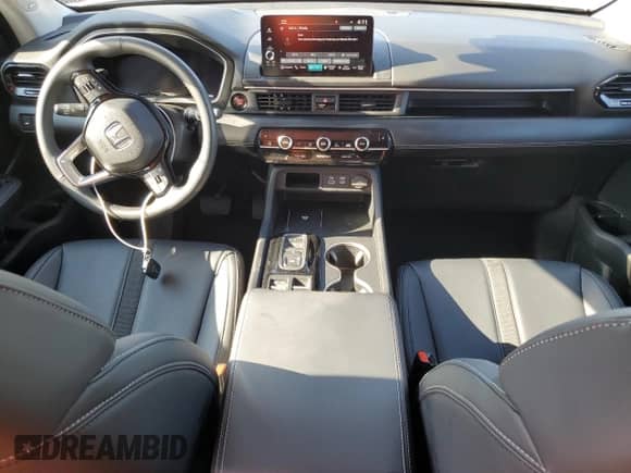 2025 Honda Pilot Touring с VIN 5FNYG1H76SB044787, выставлен на аукционе Copart как лот 80685445 с пробегом 4 493 миль миль и Списание • Salvage title. История ставок и продаж доступна на DreamBid. Изображение 8.