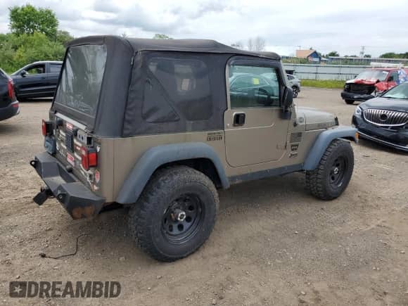 2004 Jeep Wrangler Rubicon with VIN 1J4FA69S24P713388, listed as a Copart auction lot 61196515 with 155,092 mi miles and Clean title. Bid and sale history available at DreamBid. Image 3.