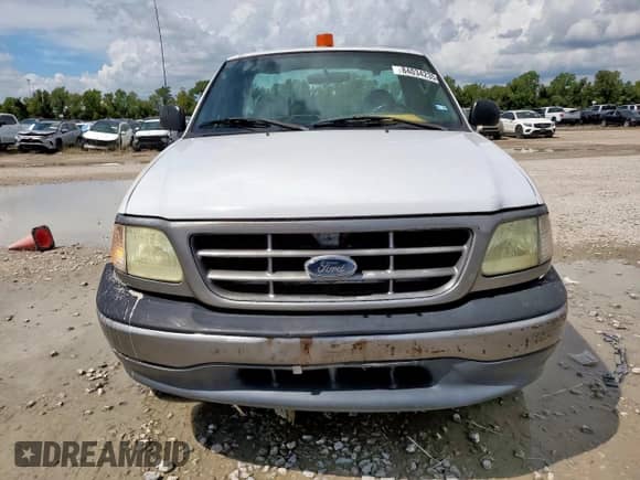 2003 Ford F-150 XL с VIN 1FTRF17WX3NA39532, выставлен на аукционе Copart как лот 84034235 с пробегом Не указан миль и Чистый • Clean title. История ставок и продаж доступна на DreamBid. Изображение 5.