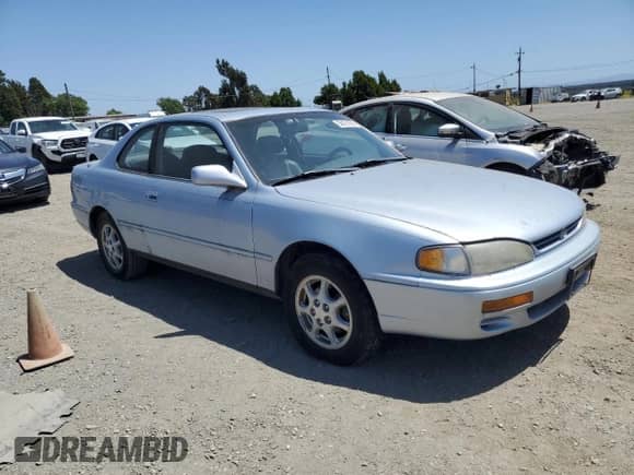 1995 Toyota Camry z VIN 4T1GK12C7SU099655, wystawiony jako Copart lot #58421895 z przebiegiem 89 299 mil mil oraz Czysty tytuł • Clean title. Historia ofert i sprzedaży dostępna na DreamBid. Obrazek 4.