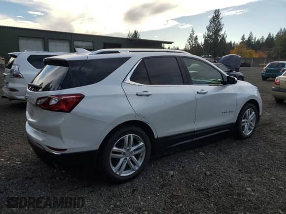 2020 Chevrolet Equinox Premier z VIN 3GNAXYEX4LS649048, wystawiony jako Copart lot #82503455 z przebiegiem 53 437 mil mil oraz Szkoda całkowita • Salvage title. Historia ofert i sprzedaży dostępna na DreamBid. Obrazek 3.