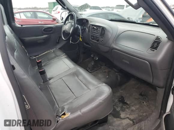 2003 Ford F-150 XL z VIN 1FTRF18W03NA77544, wystawiony jako Copart lot #84805894 z przebiegiem Nie podano mil oraz Szkoda całkowita • Salvage title. Historia ofert i sprzedaży dostępna na DreamBid. Obrazek 10.