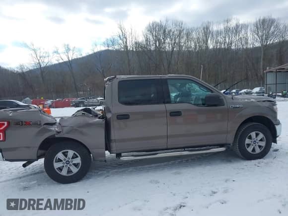 2018 Ford F-150 XL z VIN 1FTEW1EB6JFC63953, wystawiony jako IAAI lot #41304091 z przebiegiem 74 636 mil mil oraz . Historia ofert i sprzedaży dostępna na DreamBid. Obrazek 13.