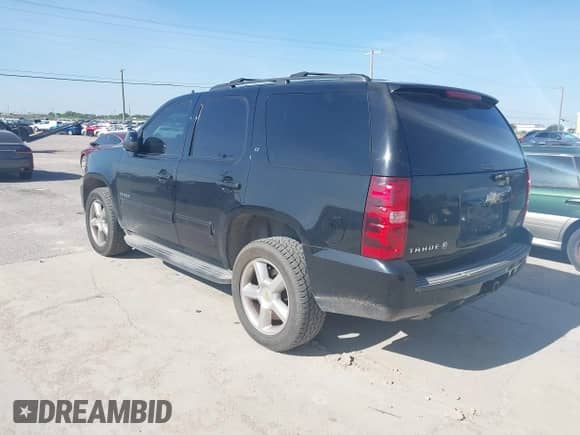 2011 Chevrolet Tahoe LT z VIN 1GNSCBE09BR140039, wystawiony jako IAAI lot #42728213 z przebiegiem 229 460 mil mil oraz . Historia ofert i sprzedaży dostępna na DreamBid. Obrazek 3.