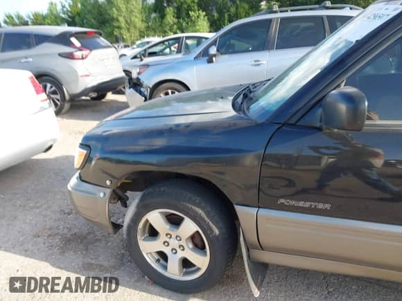 1999 Subaru Forester S with VIN JF1SF6552XH736647, listed as a IAAI auction lot 42565079 with 215,244 mi miles and . Bid and sale history available at DreamBid. Image 6.