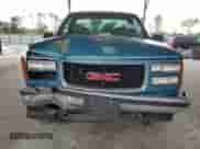 1997 GMC Sierra 1500 с VIN 1GTEK14R2VZ514577, выставлен на аукционе Copart как лот 54443015 с пробегом 214 823 миль миль и Списание • Salvage title. История ставок и продаж доступна на DreamBid. Изображение 5.