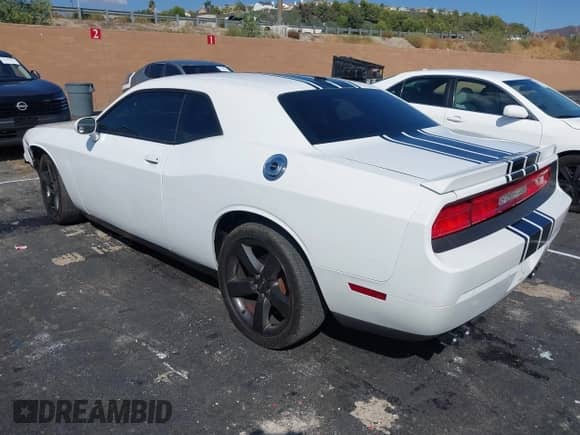2013 Dodge Challenger SXT с VIN 2C3CDYAG0DH511936, выставлен на аукционе IAAI как лот 43316730 с пробегом 173 412 миль миль и . История ставок и продаж доступна на DreamBid. Изображение 3.