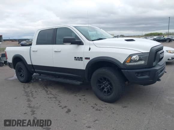 2018 Ram 1500 Rebel with VIN 1C6RR7YT8JS150942, listed as a IAAI auction lot 42168638 with 99,060 mi miles and . Bid and sale history available at DreamBid. Image 1.