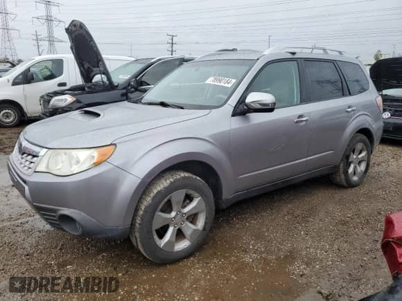 2011 Subaru Forester XT Touring with VIN JF2SHGGC8BH741416, listed as a Copart auction lot 78990184 with 82,789 mi miles and Salvage title. Bid and sale history available at DreamBid. Image 1.