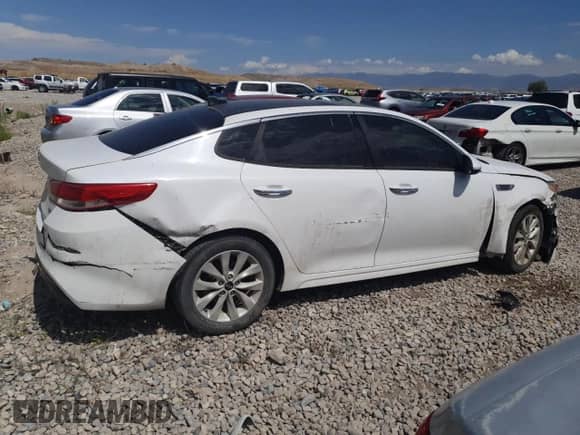 2016 Kia Optima EX with VIN 5XXGU4L39GG009322, listed as a Copart auction lot 69395095 with 116,009 mi miles and Salvage title. Bid and sale history available at DreamBid. Image 3.