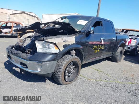 2018 Ram 1500 Laramie with VIN 1C6RR7NM9JS354632, listed as a IAAI auction lot 41707593 with Not provided miles and . Bid and sale history available at DreamBid. Image 2.