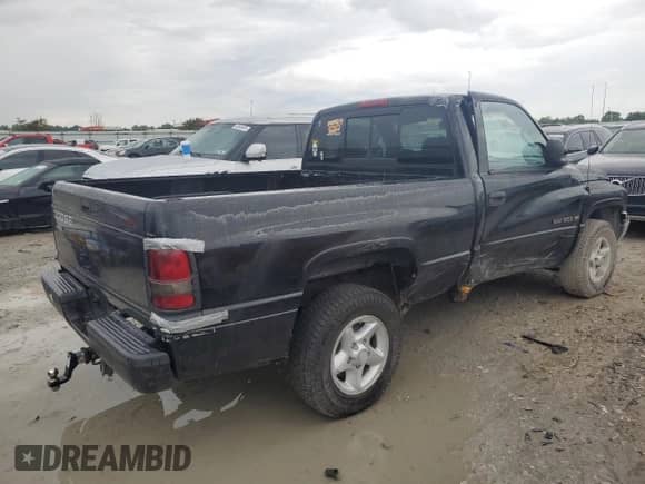 2001 Dodge 1500 Work Special with VIN 1B7HC16X01S174578, listed as a Copart auction lot 60694465 with 179,534 mi miles and Salvage title. Bid and sale history available at DreamBid. Image 3.