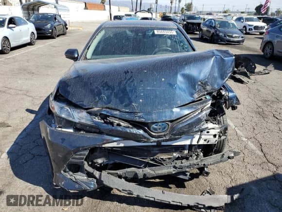 2019 Toyota Camry Hybrid LE с VIN 4T1B31HK2KU517027, выставлен на аукционе Copart как лот 85885055 с пробегом 84 432 миль миль и Списание • Salvage title. История ставок и продаж доступна на DreamBid. Изображение 5.