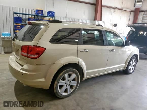 2011 Dodge Journey LUX z VIN 3D4PH9FG6BT515352, wystawiony jako Copart lot #66771215 z przebiegiem 152 628 mil mil oraz Czysty tytuł • Clean title. Historia ofert i sprzedaży dostępna na DreamBid. Obrazek 3.
