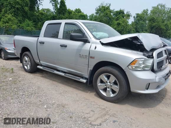 2015 Ram 1500 Express with VIN 1C6RR7KTXFS599751, listed as a IAAI auction lot 42372393 with 103,289 mi miles and . Bid and sale history available at DreamBid. Image 1.