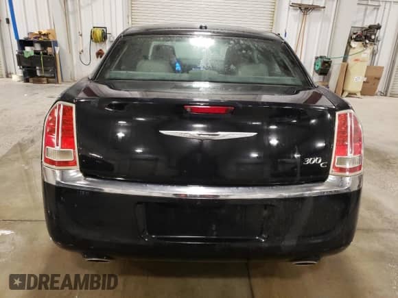 2013 Chrysler 300 C с VIN 2C3CCAET1DH711645, выставлен на аукционе Copart как лот 52899625 с пробегом 122 063 миль миль и На запчасти • Non repairable. История ставок и продаж доступна на DreamBid. Изображение 6.