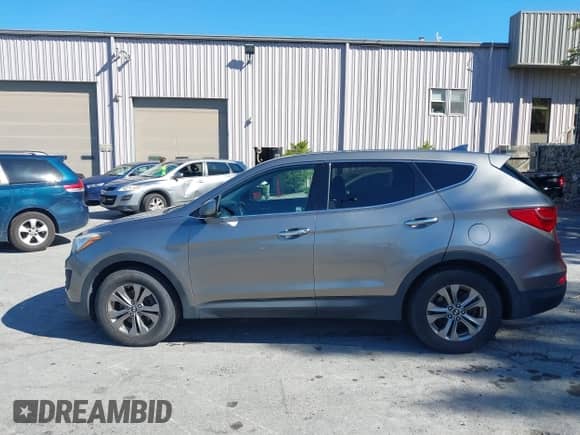 2014 Hyundai Santa Fe z VIN 5XYZTDLB8EG144660, wystawiony jako IAAI lot #43177925 z przebiegiem 149 685 mil mil oraz . Historia ofert i sprzedaży dostępna na DreamBid. Obrazek 14.
