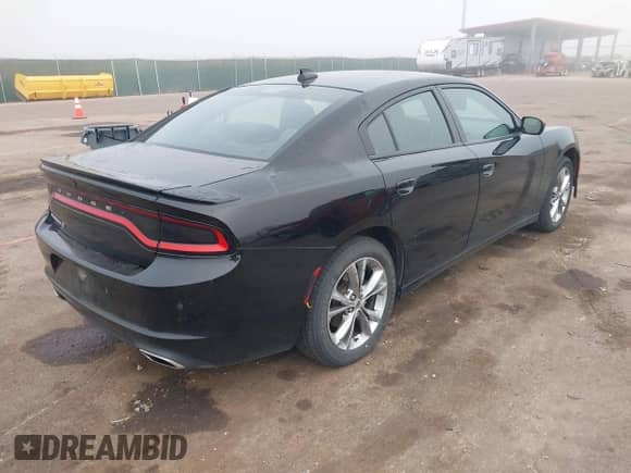 2020 Dodge Charger SXT with VIN 2C3CDXJG5LH105109, listed as a IAAI auction lot 43171842 with 95,567 mi miles and . Bid and sale history available at DreamBid. Image 4.