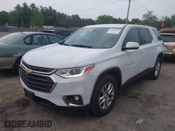 2019 Chevrolet Traverse LT with VIN 1GNEVHKW4KJ305528, listed as a IAAI auction lot 42450587 with 101,998 mi miles and . Bid and sale history available at DreamBid. Image 2.